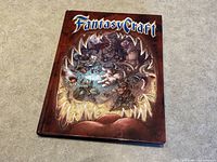 Front cover of FantasyCraft 2009 hardcover RPG core rulebook showing detailed fantasy battle artwork.