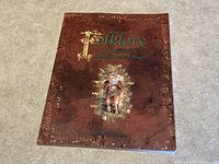 Front cover of the book "Folklore & Legends of Trinidad and Tobago" showing title, author, and artwork.