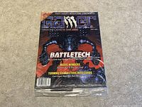 Sealed Fall 1996 Gamer Magazine cover showing BattleTech feature and free Magic: The Gathering card label.