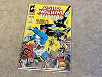 Front cover of Justice Machine Annual #1 comic book, shows several superheroes in vivid action poses on yellow background with publication details and 'An Echo of Thunder' subtitle.