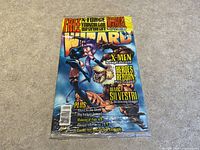 Full front view of sealed comic book featuring colorful Marvel Wizard branding and character artwork, highlighting the sealed condition.