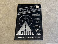 Front cover of the book 'The AADA Vehicle Guide' showing details of publisher and vehicle illustrations.