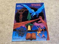Front cover of 'The Tome' adventure book shows fantasy imagery relevant to its roleplaying content.