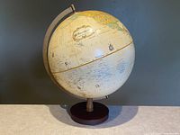 Front view of vintage 12-inch Globemaster globe showing logo and geographic details