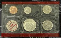 First image shows a 1969 US proof-like coin set containing half dollar, quarter, dime, nickel, penny, and a US Mint packaging insert, all sealed in plastic.