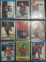 Photo showing the front faces of 9 Montreal Canadiens hockey cards in protective sleeves, featuring various players in team uniforms.