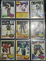 Front view of all nine NHL 1980-81 O-Pee-Chee hockey player trading cards showing player images, team logos and card design.