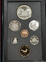 Photo of the 1989 Canadian silver proof coin set showing six coins in black foam display tray including double dollar, quarter, dime, nickel, penny, and dollar coin.