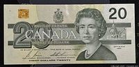 Front view of the 1991 Canadian 20 dollar banknote showing Queen Elizabeth II and the denomination with security features.