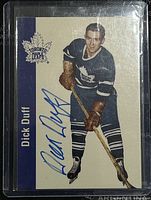 Front of the 1994-5 Parkhurst Dick Duff hockey card #126 signed by Dick Duff, showing player image and autograph.
