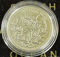 Obverse side showing the detailed floral design with 'JULY 1999', 'CANADA' inscriptions, and 92.5% silver mark implied from seller description.