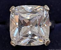 Close-up photo of the sterling silver ring showcasing the cushion-cut cubic zirconia stone from the front.