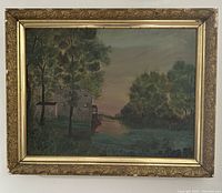 Full view of the framed watercolour painting showing the entire scene including mill, river, trees and sky, in ornate gold-toned carved wooden frame.