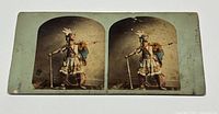 Full view of the antique stereoview card showing both images of the Indigenous figure.
