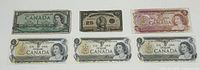 Six Canadian banknotes laid out: 1923 25 cent note, three 1973 $1 bills, 1954 $1 bill, 1974 $2 bill