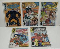 Front view of the five bagged and boarded comic books arranged in two rows, showing cover artwork for issues #271, 273, 274, 275, and 276.