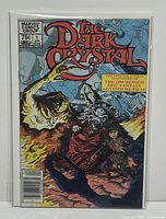 Front cover of The Dark Crystal issue #1 Marvel comic book in a protective bag and board.