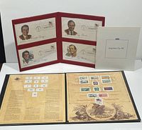 Open Inauguration Day 1981 portfolio showing Ronald Reagan and George H.W. Bush illustrated first day covers in red folio