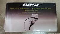 Box of Bose in-ear headphones showing brand, model, and image of headphones.