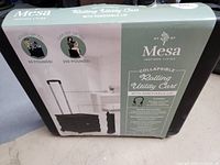 Box of Mesa Collapsible Rolling Utility Cart featuring product image and key features such as removable lid, telescoping handle, capacity details