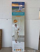 Full view of the new sealed box with the Stander Security Pole and Curve Grab Bar, shows packaging and product branding