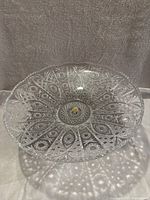 Top-down photo of the clear crystal bowl showing detailed etchings and overall shape.