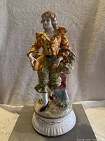 Front view of the figurine showing full pose and paint condition