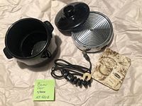 Ceramic bean pot, lid, chrome warming base, coiled cord, booklet overview