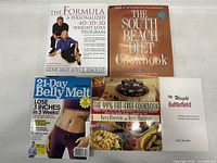 All five diet and nutrition books front covers visible