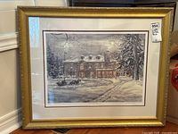Framed limited edition print showing McNichol Mansion in winter setting.