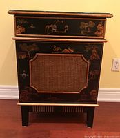 Front view of closed cabinet showing drawer and door