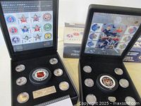 Two black display boxes open showing eight silver medallions each, commemorative NHL stamps behind clear covers, with hockey puck or emblem in the center.