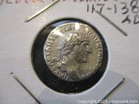 Close-up of obverse showing laureate bust of Hadrian and legend