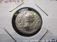 Obverse side of the silver Roman denarius coin showing a profile bust of Flavilla with inscriptions.