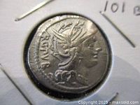 Obverse side of the silver denarius coin showing a helmeted figure in profile.