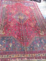 Full view of entire rug laid flat on floor