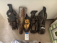 All five masks shown together for size and style comparison