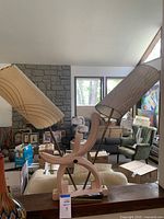 Full view of lamp showing dual shades and base in room setting