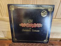 Front cover of The Worst of Jefferson Airplane LP showing black background with gold decorative border and text, Best Buy Series promotional stamp.