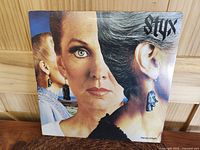 Front cover of Styx Pieces of Eight 1978 vinyl album showing detailed composite face artwork