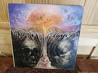 Front cover of the gatefold LP showing psychedelic artwork with the band name and album title blending into the image.