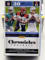 Front of sealed 2020 NFL Chronicles Football wax pack showing players Joe Burrow, Justin Herbert, and Tua Tagovailoa