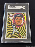 Front view of the graded Ronald Acuna Jr. Topps Chrome Ultra Violet All-Stars card with psychedelic spiral background, shown in a SGC plastic slab with grade 10 label.
