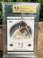Front of the Mickey Mantle 2007 Topps Moments & Milestones baseball card with grading label showing Mint 9 score and subgrades.
