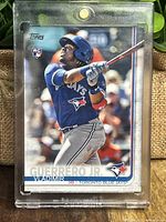 Front image of Vladimir Guerrero Jr. 2019 Topps rookie card in protective case.
