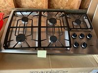 Full view of Bosch 36-inch gas cooktop with five burners and control knobs on the right side.