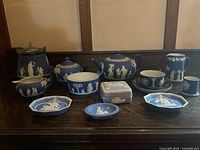 Wide group shot showing full lot on wood surface