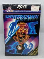Full front view of sealed Atari 2600 Winter Games box showing colorful winter sports-themed artwork and Epyx logo.
