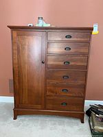 Front view of cabinet showing six drawers on right and single door on left