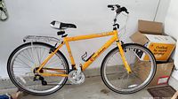 Full side view of the orange Tonino Lamborghini Leggenda bicycle